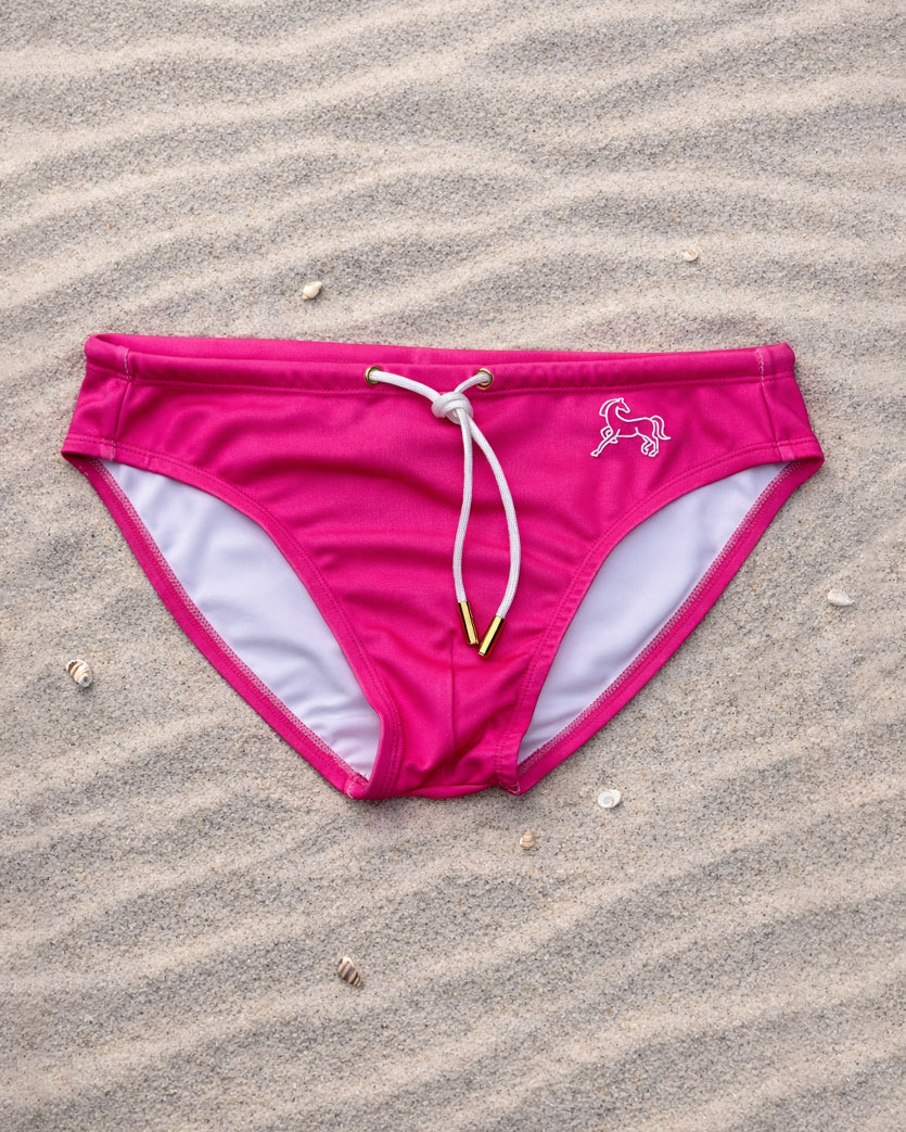 Pink men’s swim brief with white drawcord and white lining, low-rise swim briefs