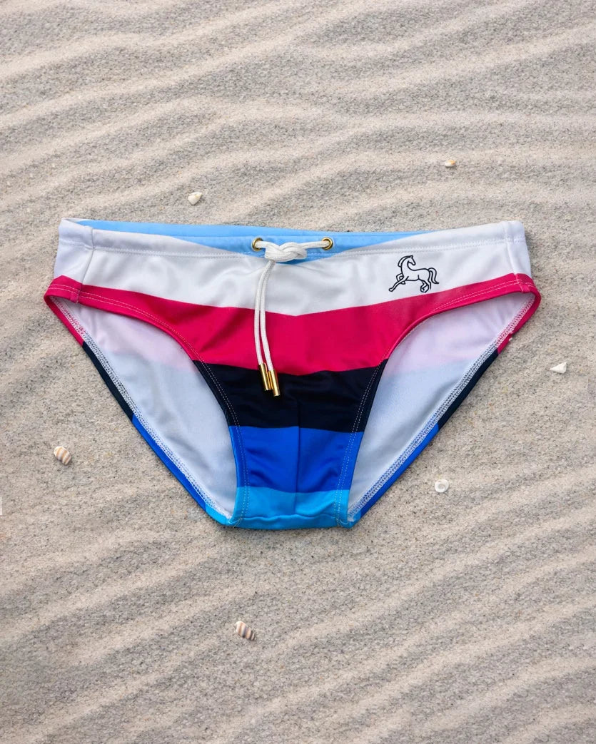 Chevron swim brief with red, white, and blue horizontal stripes, low-rise fit, recycled fabric, designed & made in Australia